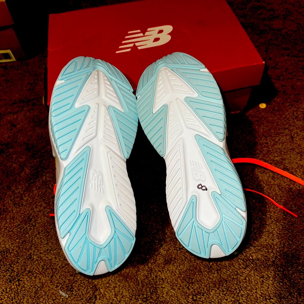 Kids New Balance  peach and teal size 2